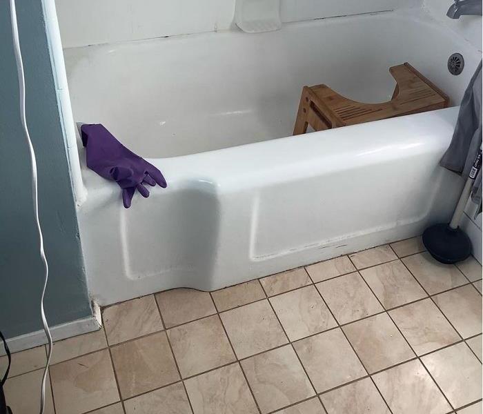 Bath tub and tile flooring cleaned after sewage back up