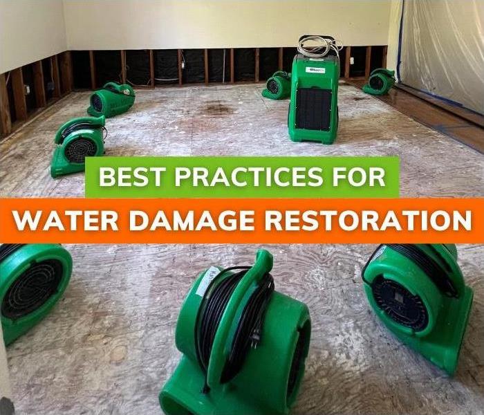 Fans and a dehumidifier restoring a space after water damage | Best Practices for Water Damage Restoration